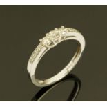 A 9 ct white gold ring, set with diamonds, ring size M/N, 2.1 grams gross weight.