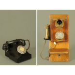 A wall mounted vintage telephone with brass and Bakelite earpiece and mouthpiece,