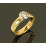 An 18 ct gold diamond ring +/- 0.40 carat, ring size L, 5.9 grams gross.