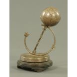 An early 20th century silver plated desk ornament,