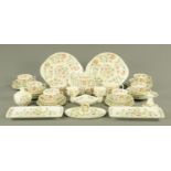 A collection of thirty eight pieces of Minton Haddon Hall patterned tea and dinnerware.