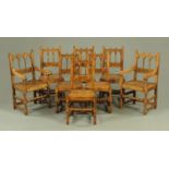 A set of two carver arm and six single oak Yorkshire style dining chairs,