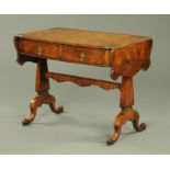 A 19th century walnut veneered sofa table, with crossbanded edge with shaped drop leaves,