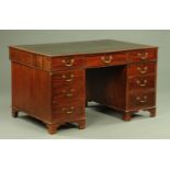 A 19th century mahogany partners desk,