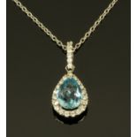 An 18 ct gold aquamarine and diamond necklace, with drop pendant. Aquamarine +/- .