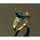 A ladies Continental 9 ct gold dress ring, set with facet cut topaz, size Q.
