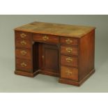 A 19th century mahogany kneehole desk,