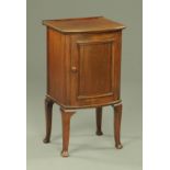 A George V mahogany bow front bedside cabinet,