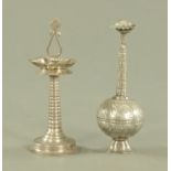 A Persian silver rose water sprinkler, with chased scrolling decoration, upon a circular foot,