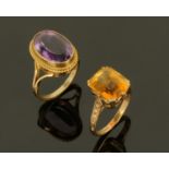 Two 9 ct gold dress rings, set with amethyst and citrine coloured stones, size L.