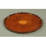 A 19th century mahogany inlaid and oval drinks tray,
