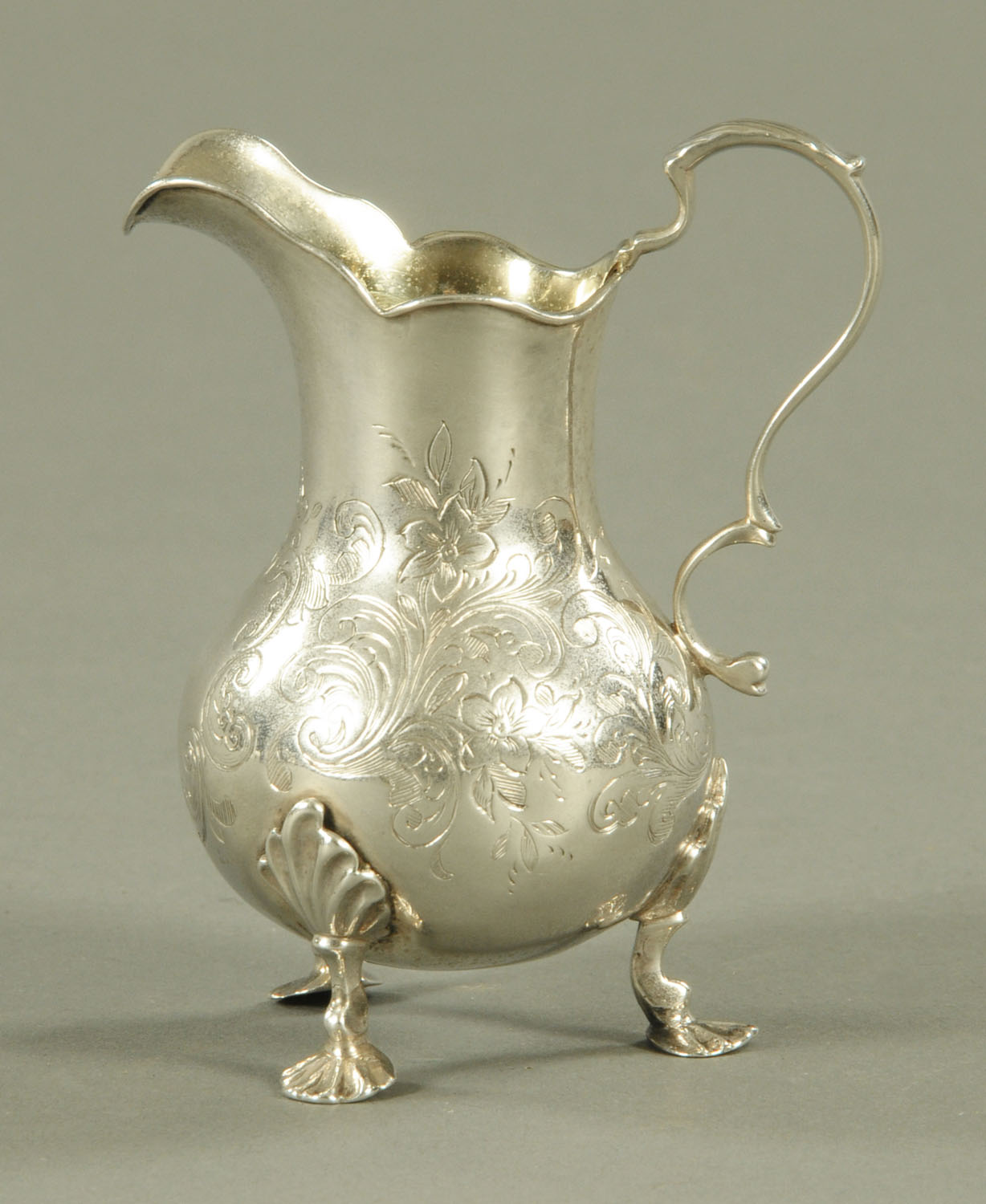 A Victorian silver cream jug, Daniel and Charles Houle, London 1849,