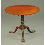 A 19th century mahogany tripod table with piecrust edge, snap action,