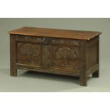 An antique oak coffer,