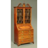 A 19th century mahogany and inlaid bureau bookcase,