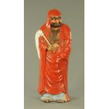 A large Japanese Kutani figure of Daruma, Meiji period,