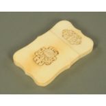 A Canton carved ivory card case, circa 1880, with serpentine sides,