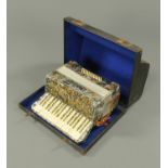 A Belazani piano accordion, cased.