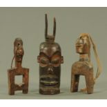 Three African tribal art wood carvings,