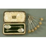 A pair of silver preserve spoons, in fitted presentation case, with pierced terminals,