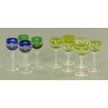A set of six Bohemian green flash hock glasses, on faceted stem with star cut base,