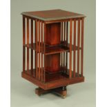 An early 20th century mahogany revolving bookcase,