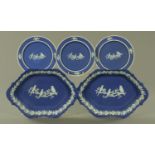 A pair of Wedgwood Jasperware and sprigged shaped dishes, with three matching side plates,