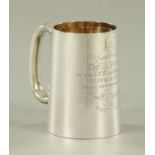 A silver pint tankard,