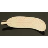 An angel skin coral feather brooch, 19th century, finely carved as a birds feather,