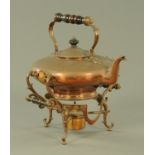 A large 19th century copper spirit kettle and stand, with turned wood handle,
