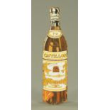 A vintage French enamelled brandy bottle sign, Castillon. Height 45 cm.