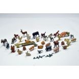 An interesting group of metal animal figures from various makers including Britains comprising