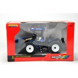 Britains 1/32 Farm Diecast model comprising New holland T9.565 Tractor. NM to M in Box.