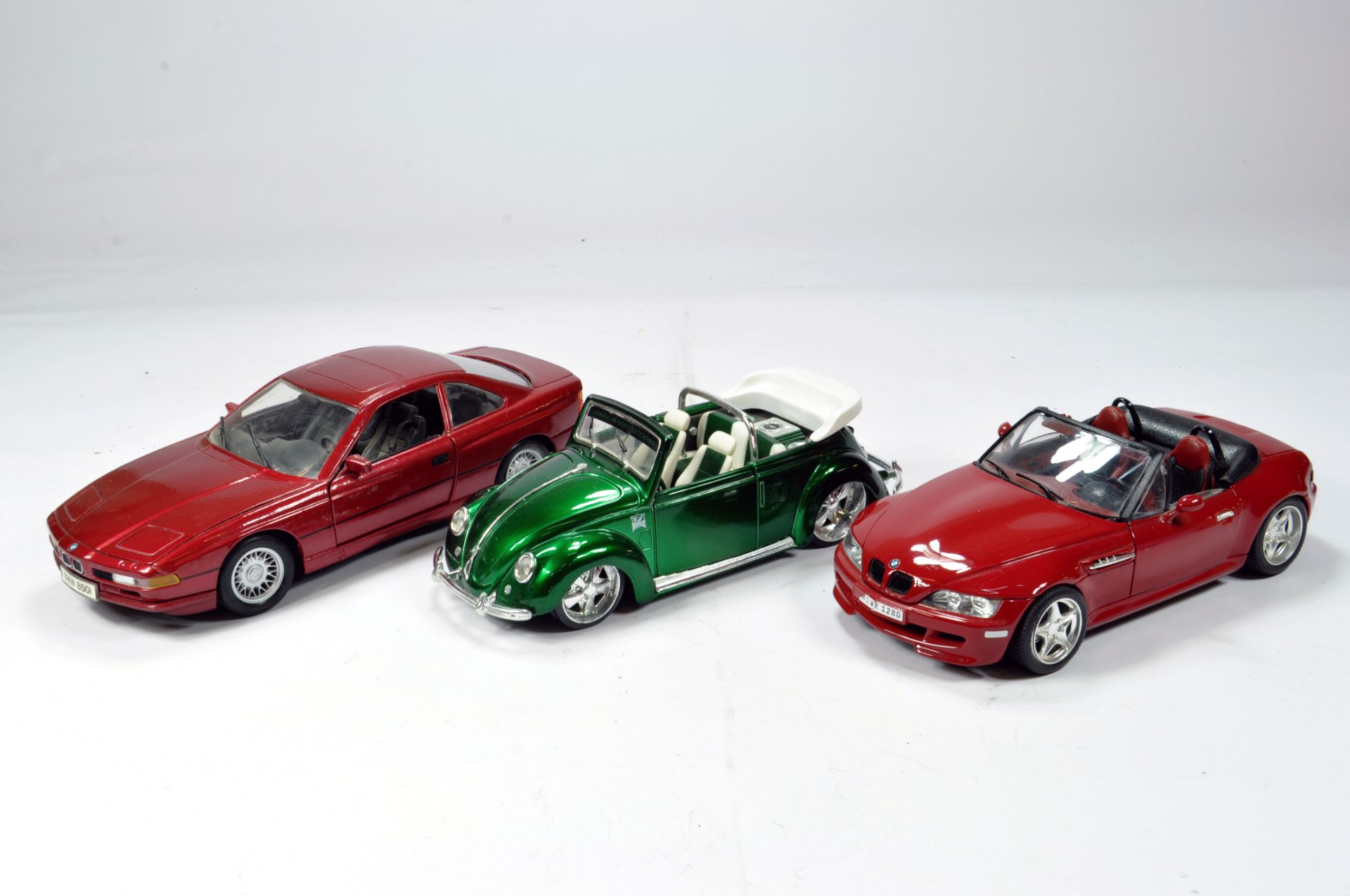 Diecast 1/18 car selection comprising various issues; BMW, VW etc. Generally VG to E. (3)