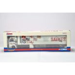 Corgi 1/50 Commercial Diecast Truck Issue comprising CC13406 MAN TGA XXL Box Trailer. Saints. NM