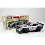 Vintage Alps (Japan) plastic battery operated model of a Datsun 280-Z. Superbly presented piece is