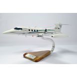 A beautifully produced resin made large scale model of a Learjet 36 aircraft.