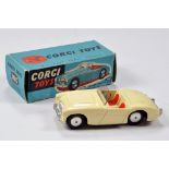 Corgi No. 300 Austin Healey Sports Car with cream body, red seats, silver trim and flat spun hubs.