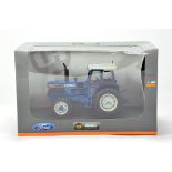 Universal Hobbies 1/32 Farm Diecast model comprising Ford 8830 Tractor. E to NM in Box.