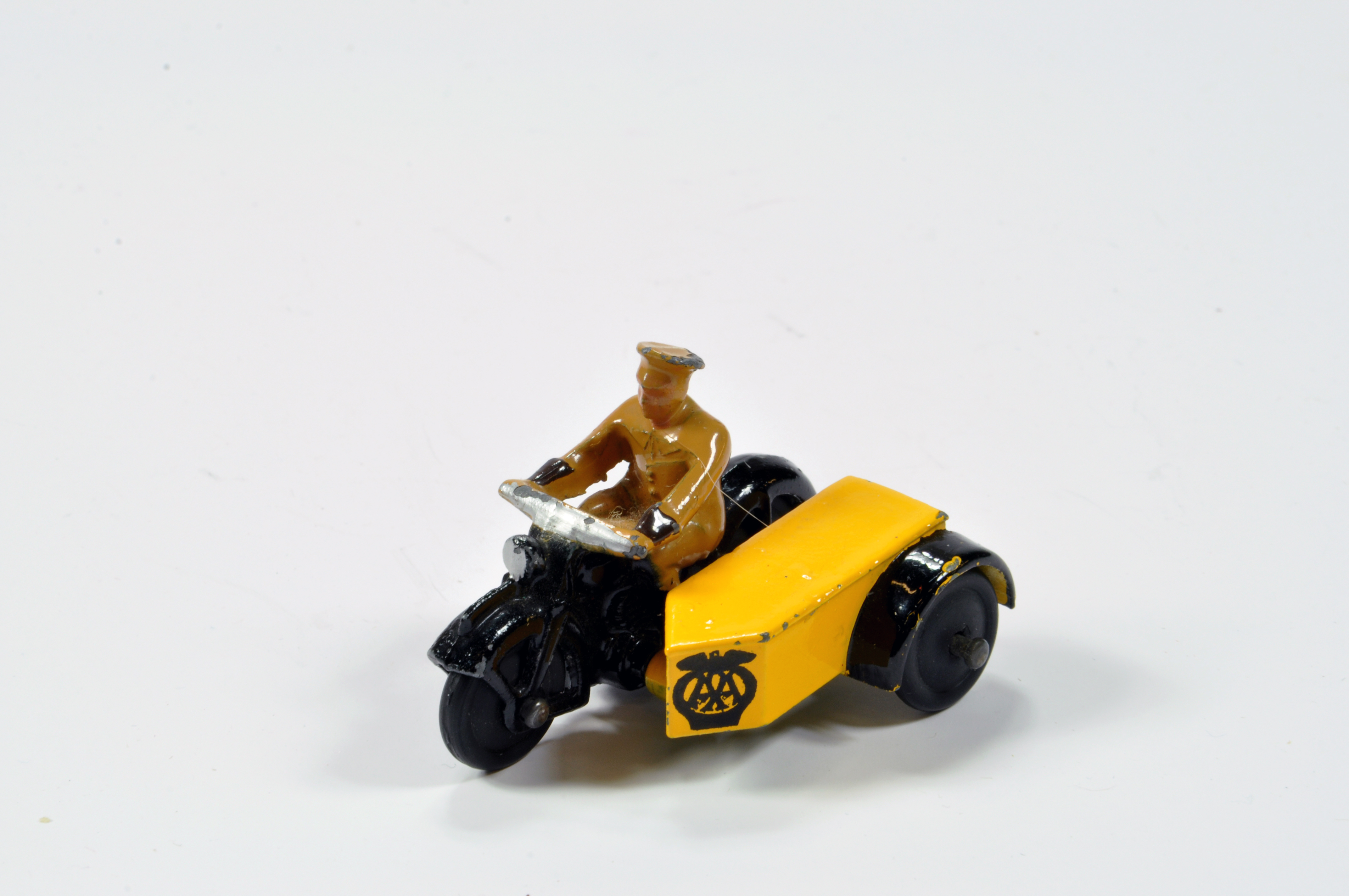 Dinky No. 270 AA Motor Cycle Patrol in black, yellow with dark tan figure rider. VG to E.
