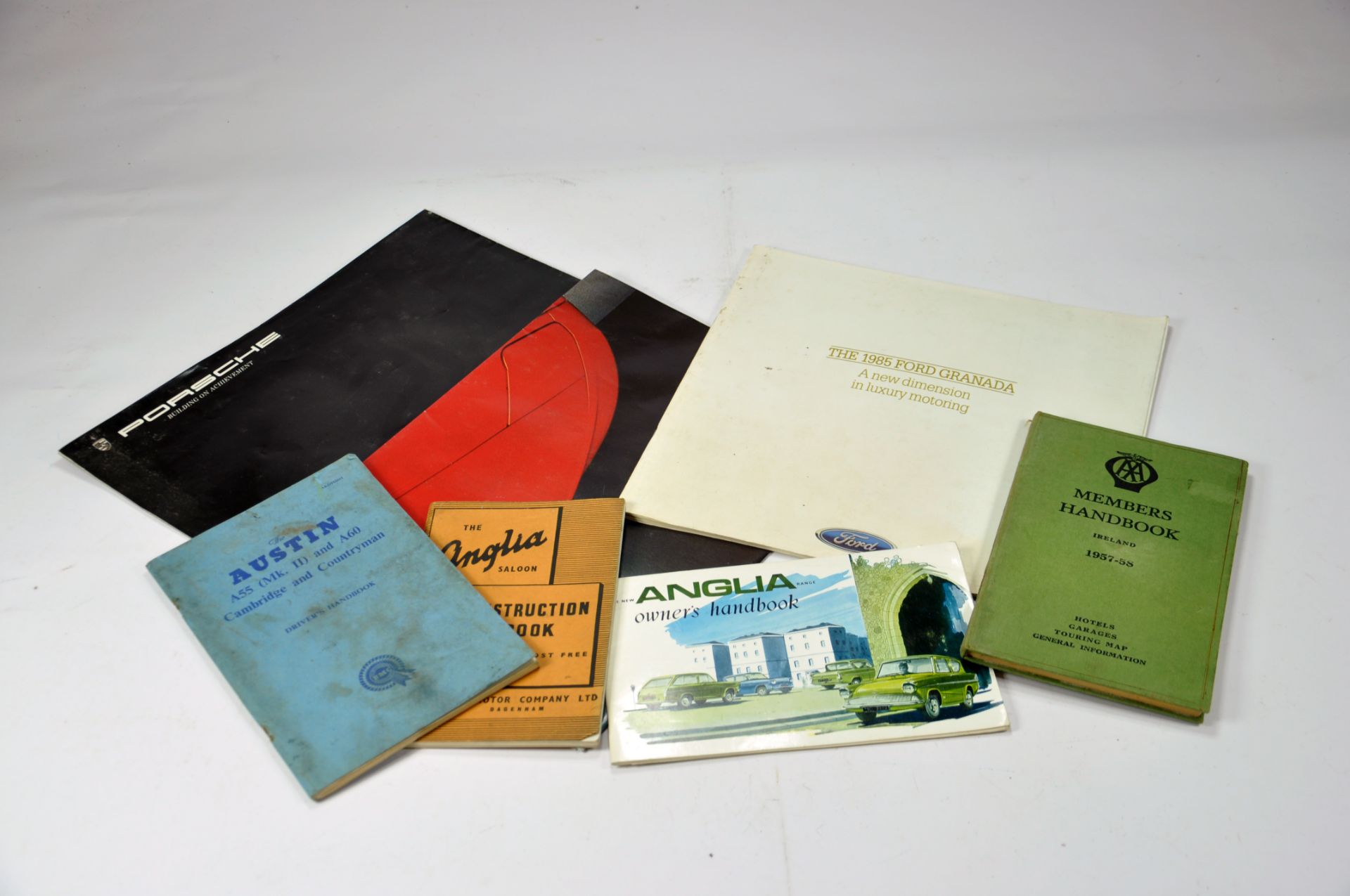 Interesting Car Instruction booklets including Austin, Anglia etc plus Granada Sales Brochure.