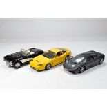 Diecast 1/18 car selection comprising various issues; Ferrari, Jaguar etc. Generally VG to E. (3)