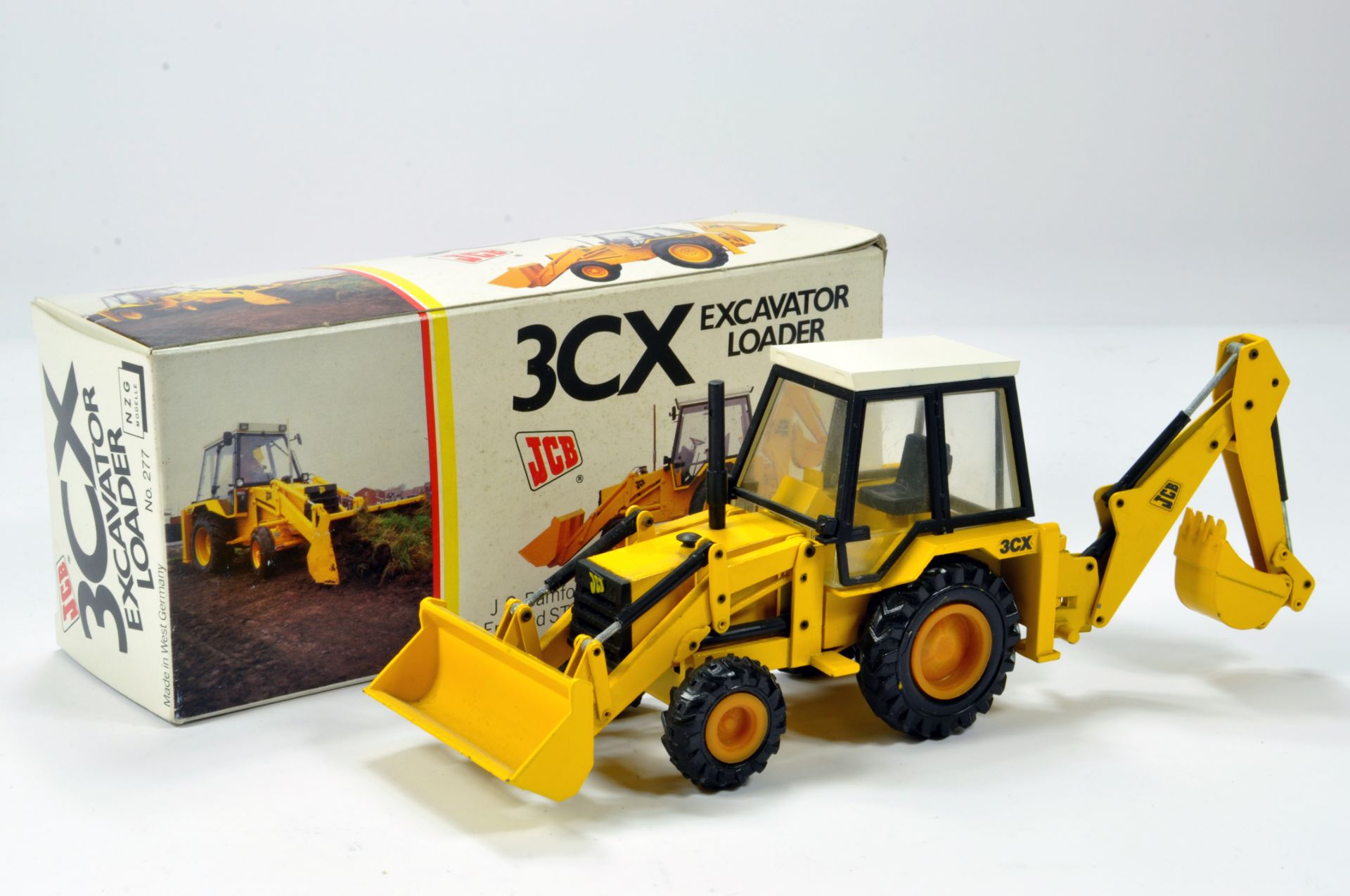 NZG 1/35 Construction Diecast Issue comprising No. 277 JCB 3CX Excavator Backhoe Loader. Black Cab