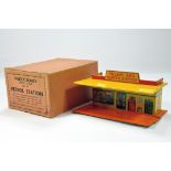 Dinky Pre-war No. 48 Petrol Station with orange tinplate base, yellow roof, yellow tinprinted