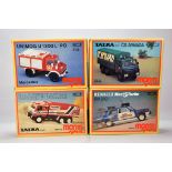 Group of plastic model kits comprising Mercedes Unimog, Taira Dakar RallyE, Renault 5 Turbo and