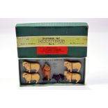 Dinky Set No. 6 Shepherd Set. Comprising 4 sheep, shepherd and dog all strung onto original