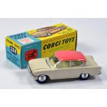 Corgi No. 234 Ford Consul Classic with pale cream body, salmon pink roof and lemon interior. NM