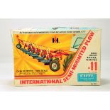 Ertl 1/25 Plastic Model Kit of a International Semi Mounted Plough. Complete.