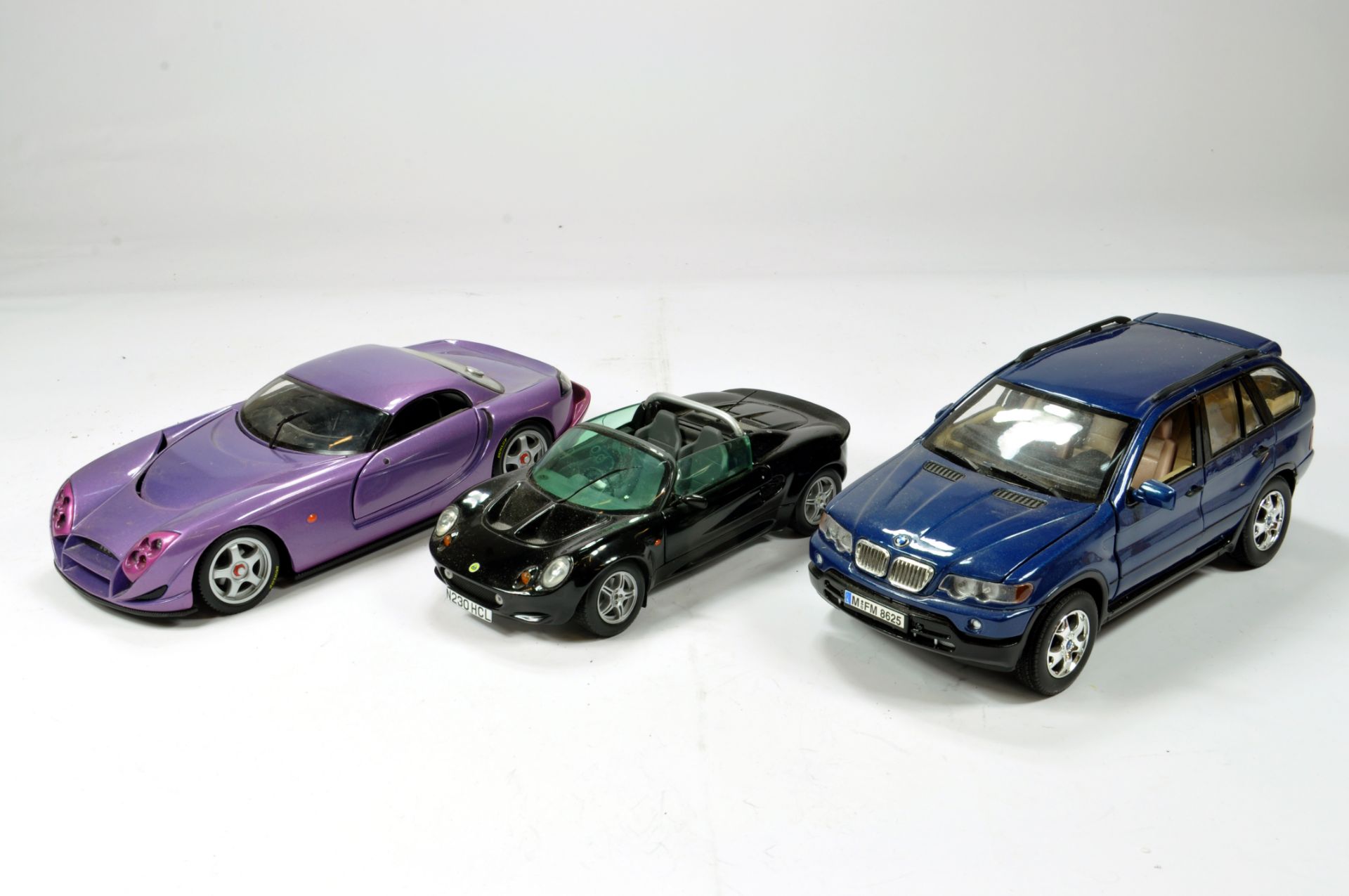 Diecast 1/18 car selection comprising various issues; BMW, Lotus etc. Generally VG to E. (3)