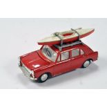 Triang Spot-On No. 274 Austin 1100 with Roof Rack and Canoe with red body and white interior. In